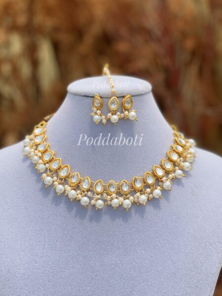 Kundan necklace with earrings and tikli