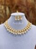 Kundan necklace with earrings and tikli