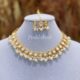 Kundan necklace with earrings and tikli
